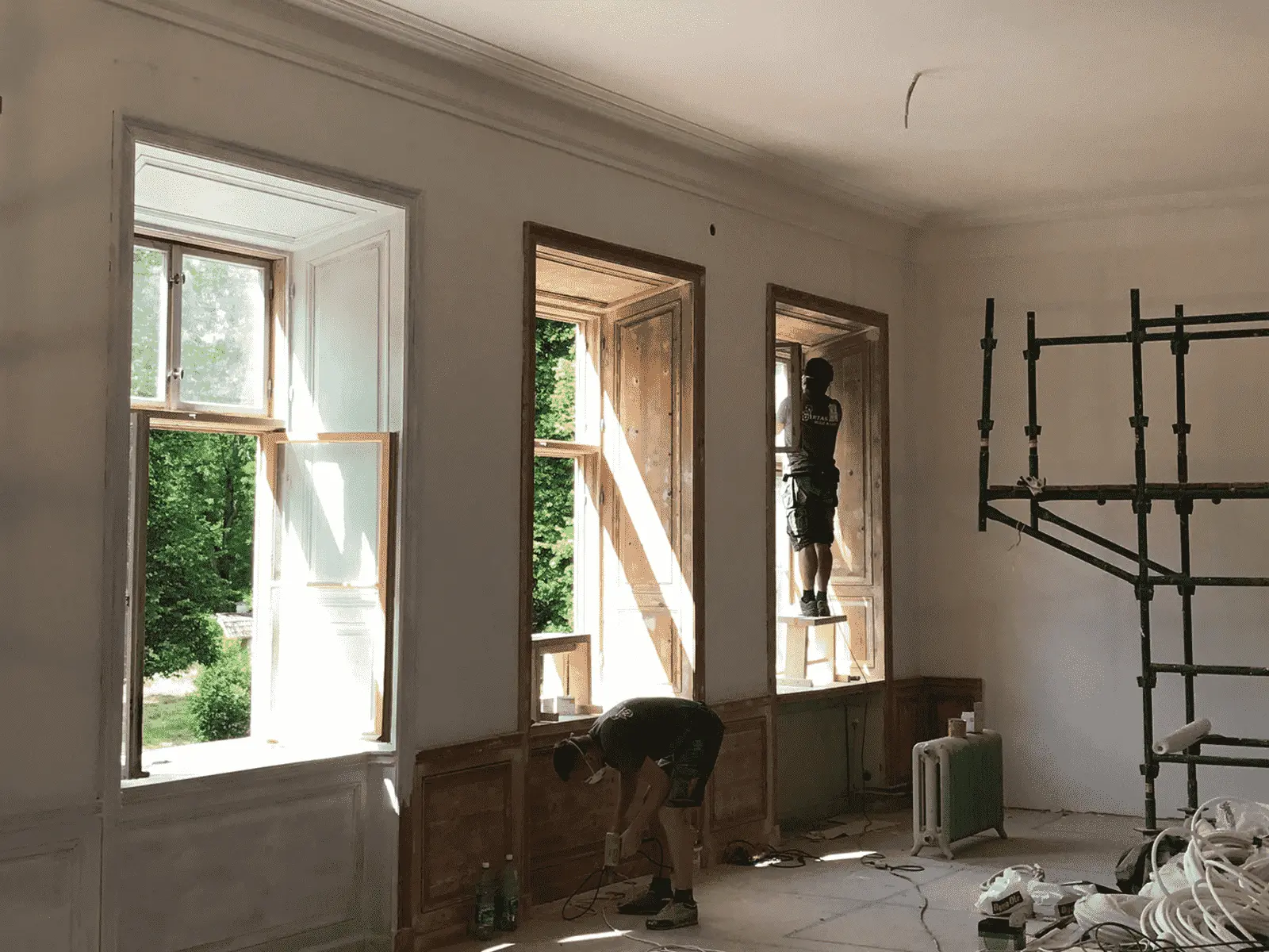 renovering av fönster i en hög byggnad renovering av fönster i en hög byggnad