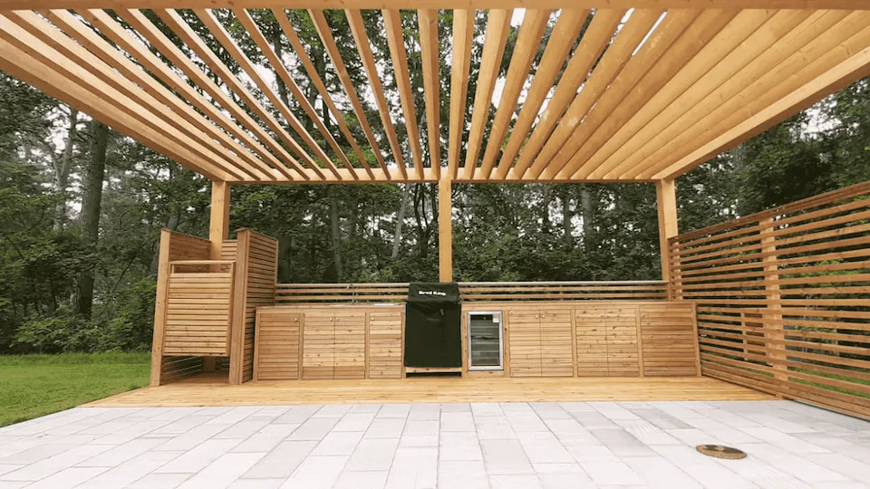 Modern träpaviljong med utekök och grill i Stockholm Modern träpaviljong med utekök och grill i Stockholm